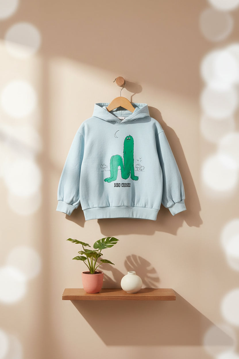 Sweat à capuche en coton bio imprimé bleu clair ludique à manches longues bouffantes avec poignets côtelés, conçu pour les enfants de 1 à 13 ans