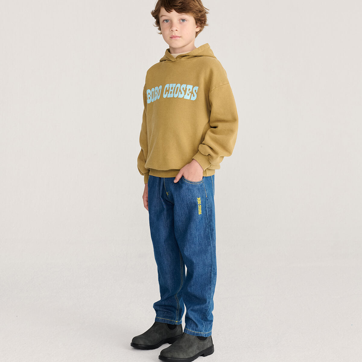 Pantalon en jean dinosaure bleu ludique avec motif graphique amusant pour les enfants (2-13 ans)